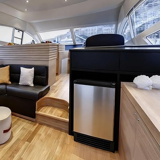 COTLIN under counter ice maker built into a boat galley cabinet, stainless steel